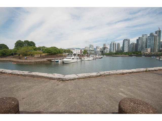 Furnished living room with city view and waterfront access. - 1122 Ironwork Passage, Vancouver West Side
