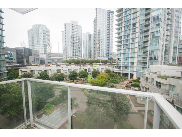 Bright living room with city view and modern furnishings. - 605 - 633 Abbott St, Vancouver Downtown