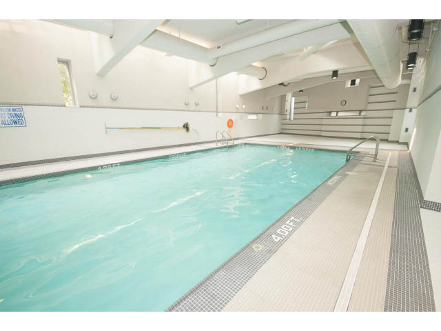 Spacious indoor pool with tiled edges and depth markers. - 605 - 633 Abbott St, Vancouver Downtown