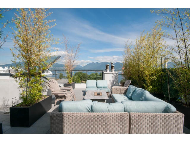 Furnished patio with outdoor seating and city view. - 708 - 27 Alexander St, Vancouver Downtown