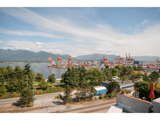 Bright balcony with stunning city view, overlooking industrial port and mountains. - 708 - 27 Alexander St, Vancouver Downtown