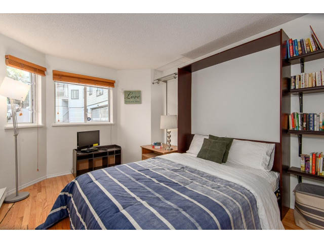 Furnished 2-bedroom condo with hardwood floors and a cozy reading nook. - 101 - 2288 Laurel st., Vancouver West Side