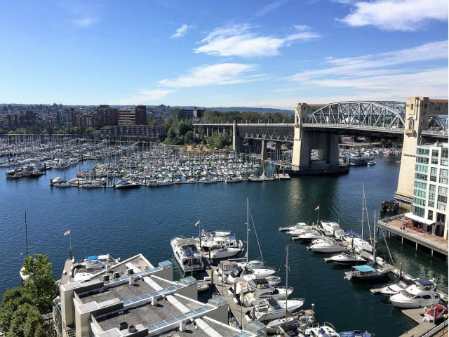 Bright kitchen with city view and waterfront access. - 1204 - 1625 Hornby St, Vancouver Downtown