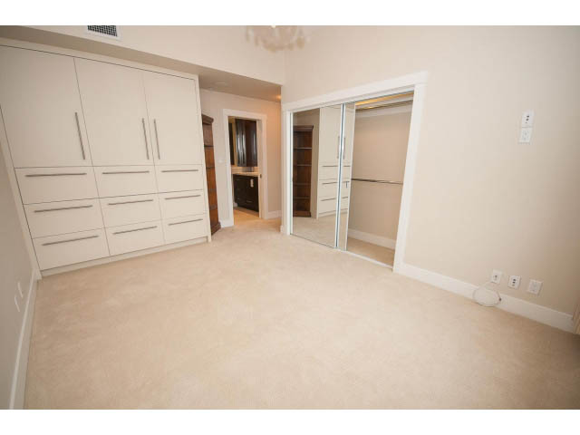Spacious den with built-in storage and mirrored closet doors. - 708 - 4685 Valley Dr, Vancouver West Side