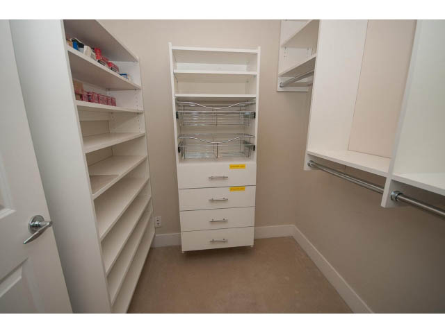 Spacious walk-in closet with pull-out shelves and drawers. - 708 - 4685 Valley Dr, Vancouver West Side