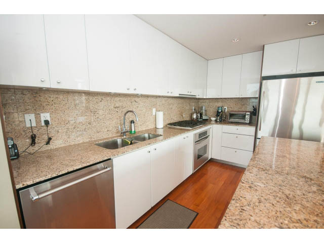 Bright kitchen with granite countertops, hardwood floors, and stainless steel appliances. - 2401 - 1005 Beach Avenue, Vancouver Downtown