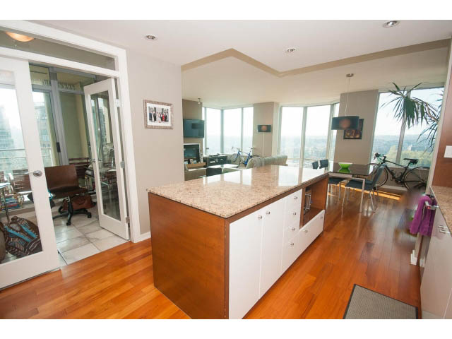 Bright kitchen with granite countertops, hardwood floors, and a city view. - 2401 - 1005 Beach Avenue, Vancouver Downtown