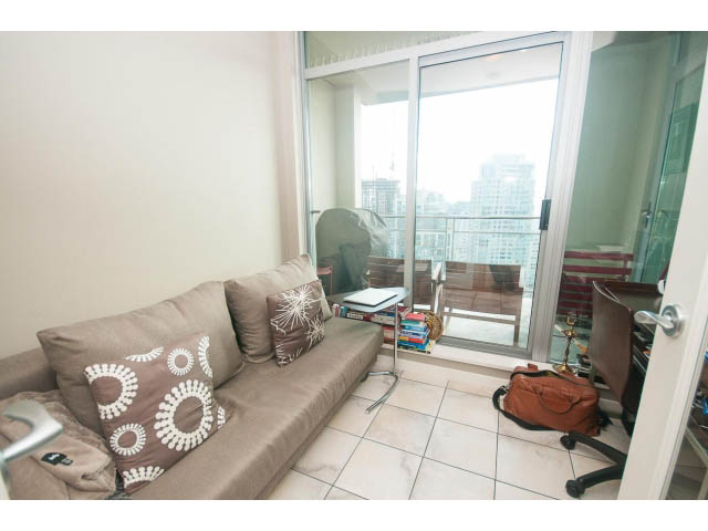 Furnished living room with city view and comfortable seating. - 2401 - 1005 Beach Avenue, Vancouver Downtown