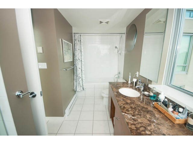 Spacious bathroom with granite countertops and a walk-in shower. - 2401 - 1005 Beach Avenue, Vancouver Downtown