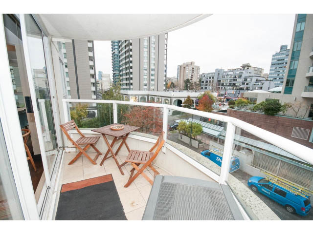 Furnished balcony with city view and outdoor seating. - 303 - 717 Jervis St, Vancouver Downtown