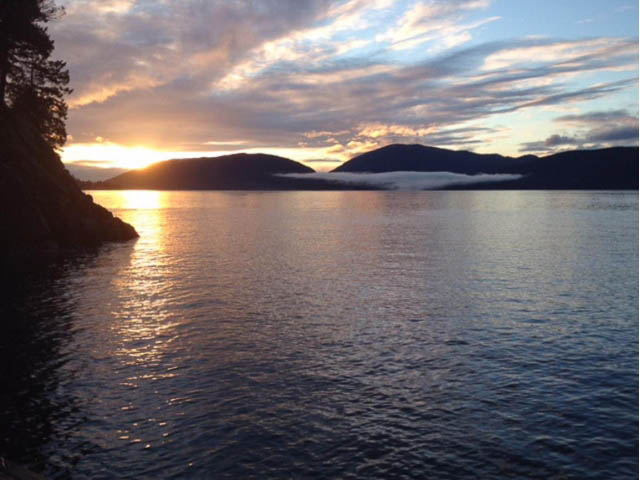 Spectacular sunset over the water, serene lake view. - 8135 Pasco Rd, West Vancouver