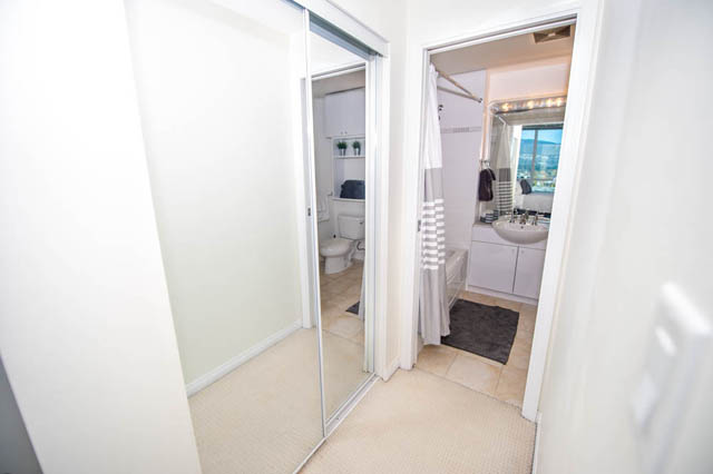 Bright bathroom with city view and modern fixtures. - 1905 - 138 East Esplanade Ave, North Vancouver