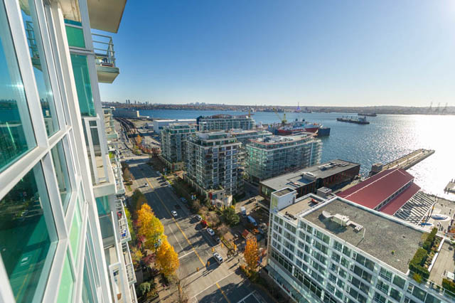 Bright living room with city view and waterfront access. - 1905 - 138 East Esplanade Ave, North Vancouver
