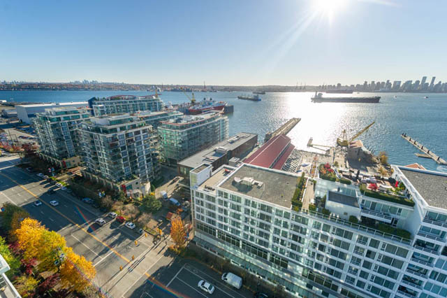 Bright living room with city view and waterfront access. - 1905 - 138 East Esplanade Ave, North Vancouver