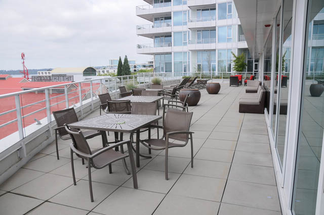 Furnished balcony with outdoor seating and city view. - 1905 - 138 East Esplanade Ave, North Vancouver