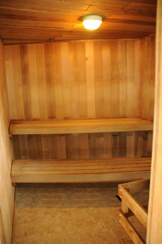Furnished wooden sauna with shelves and bench seating. - 1905 - 138 East Esplanade Ave, North Vancouver