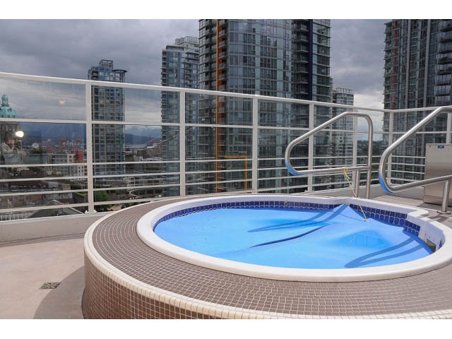Bright rooftop pool with city view and modern architecture. - 3105 - 602 Citadel Parade, Vancouver Downtown