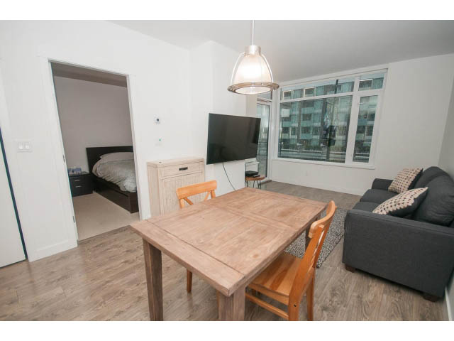Furnished 1-bedroom condo with hardwood floors and a city view from the large window. - 203 - 110 Switchmen St, Vancouver East Side