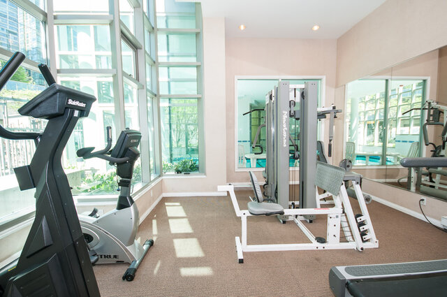 Spacious, well-lit gym with large windows and modern fitness equipment. - 2303 - 1328 West Pender Street, Vancouver Downtown