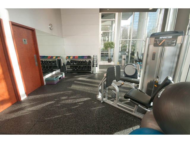 Bright and modern gym with large windows, city view, and Precor equipment. - 1402 - 1680 Bayshore Drive, Vancouver Downtown