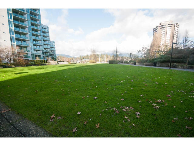 Furnished living room with a view of the city and green lawn. - 1402 - 1680 Bayshore Drive, Vancouver Downtown