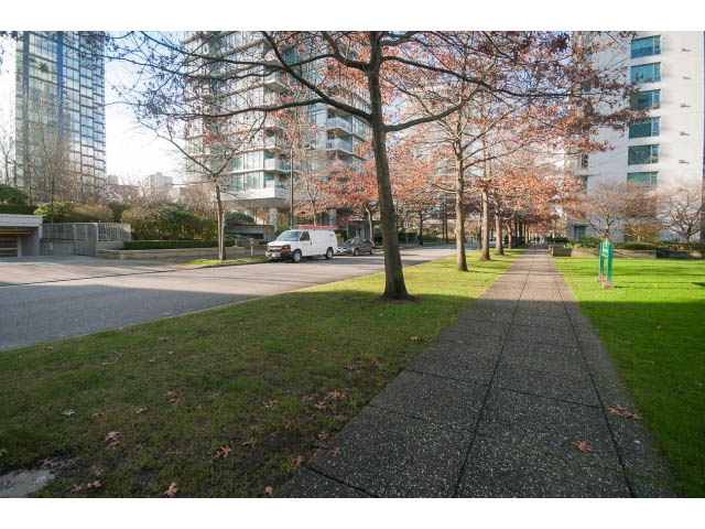 Furnished living room with cozy furniture and city view. - 1402 - 1680 Bayshore Drive, Vancouver Downtown