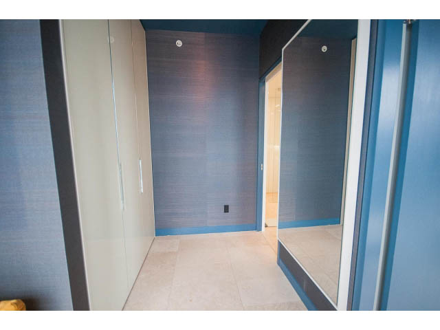Furnished living room with blue walls and tiled floor. - 2301 - 838 W Hastings, Vancouver Downtown