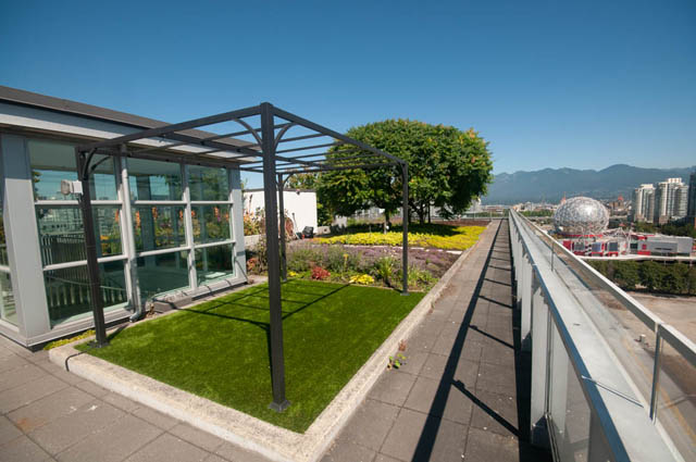 Penthouse living room with city view and outdoor patio. - 1402 - 1661 Ontario St, Vancouver West Side
