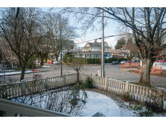 Bright living room with city view and snow-covered ground. - 398 W 13th Ave, Vancouver West Side