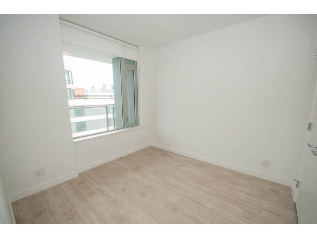 Bright living room with hardwood floors and city view. - 1108 - 1661 Quebec St, Vancouver West Side