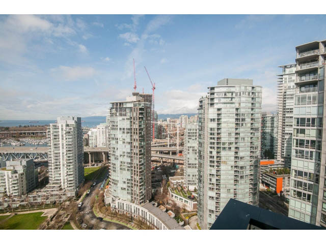 Bright living room with stunning city view and modern furnishings. - 3206 - 455 Beach Crescent, Vancouver Downtown