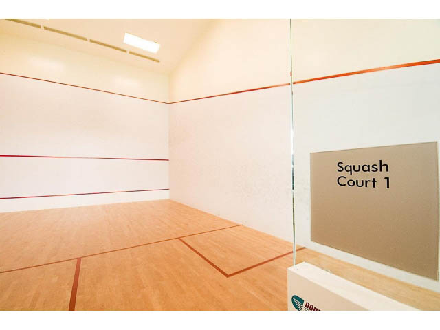 Squash court with wooden floor and glass walls, ready for play. - 3206 - 455 Beach Crescent, Vancouver Downtown