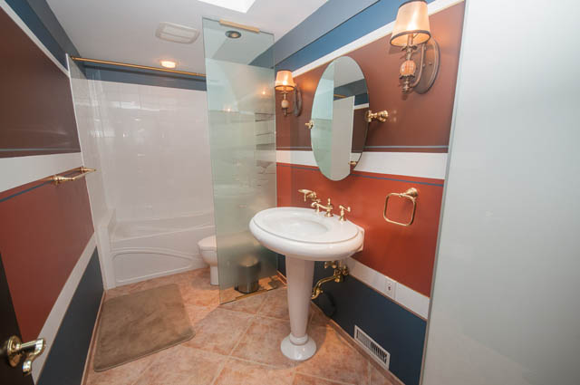 Furnished bathroom with modern fixtures and a glass shower. - 4645 Caulfeild Drive, West Vancouver