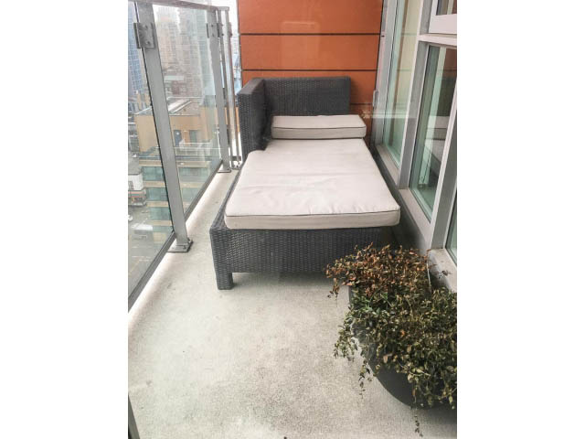 Furnished balcony with city view and comfortable seating. - 1802 - 1351 Continental St., Vancouver Downtown