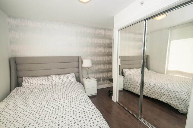 Furnished 2-bedroom condo with modern decor, large closet, and hardwood floors. - 1003 - 535 Smithe St, Vancouver Downtown