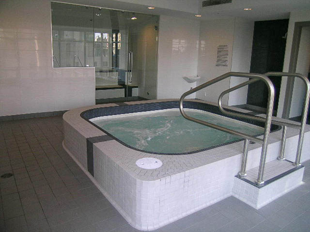 Spacious bathroom with modern fixtures and tiled walls. - 1003 - 535 Smithe St, Vancouver Downtown