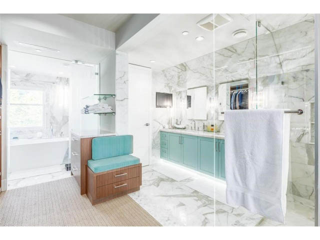 Spacious bathroom with marble countertops and teal accents. - 1 - 2888 Birch Street, Vancouver West Side