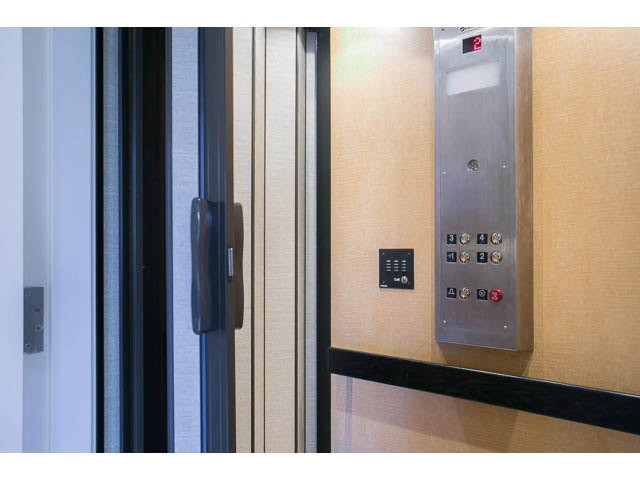 Elevator control panel with buttons and digital display. - TH18 - 1281 West Cordova Street, Vancouver Downtown