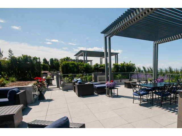Furnished penthouse patio with outdoor seating and modern pergola. - 511 - 2102 W 48th St, Vancouver West Side