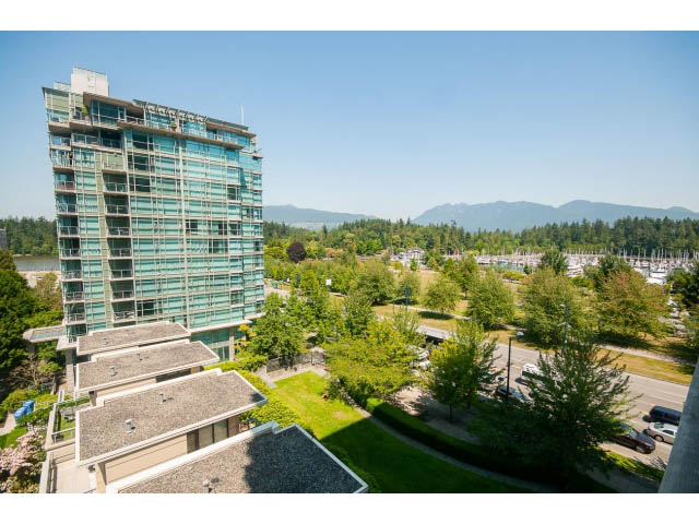 Bright living room with city view and modern furnishings. - 703 - 1863 Alberni Street, Vancouver Downtown