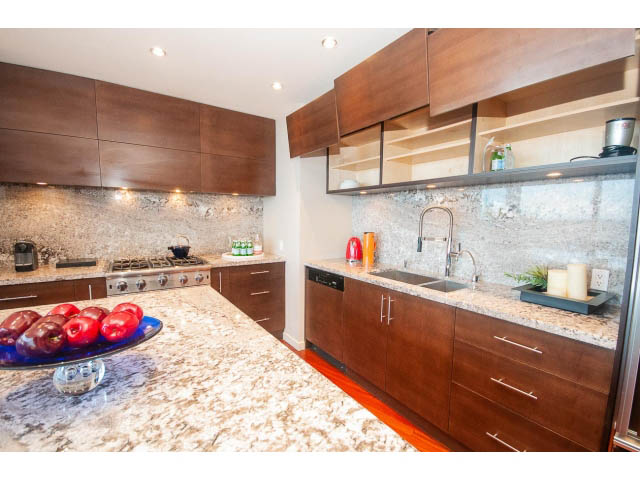 Bright kitchen with granite countertops, modern cabinetry, and stainless steel appliances. - 3403 - 938 Nelson Street, Vancouver Downtown