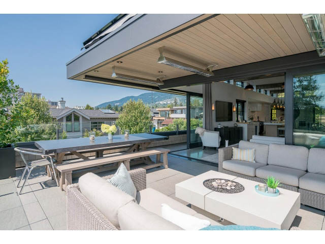 Furnished living room with outdoor patio and city view. - Address WITHHELD, West Vancouver