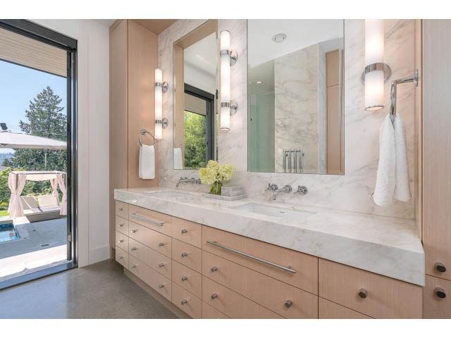 Bright bathroom with marble countertops and a city view. - Address WITHHELD, West Vancouver