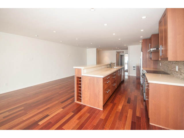 Bright kitchen with hardwood floors and modern cabinetry. - 2150 Argyle Ave., West Vancouver