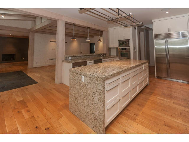 Bright kitchen with granite countertops and hardwood floors. - 5630 Angus Dr., Vancouver West Side