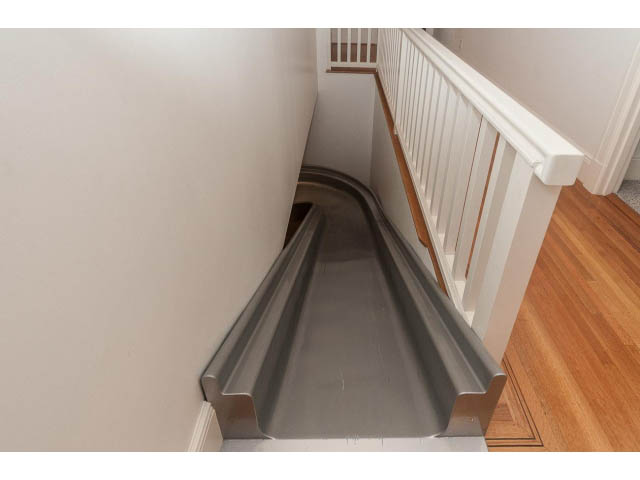 Staircase leading to upper floor with wooden flooring and white railings. - 5630 Angus Dr., Vancouver West Side