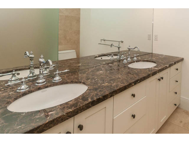 Bathroom with granite countertops and white cabinetry. - 5630 Angus Dr., Vancouver West Side