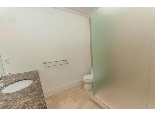 Furnished bathroom with marble countertop and glass shower. - 5630 Angus Dr., Vancouver West Side