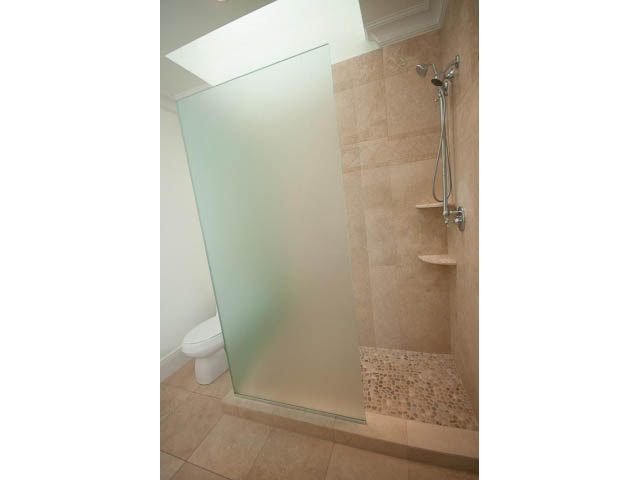 Frosted glass shower enclosure with mosaic tile floor. - 5630 Angus Dr., Vancouver West Side