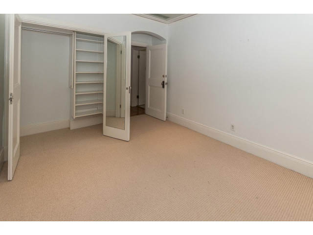 Bright den with built-in shelving and carpeted floor. - 5630 Angus Dr., Vancouver West Side